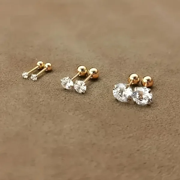 Gold stainless steel four-prong twisted ball earrings with cubic zirconia, simple and stylish design for women's daily wear