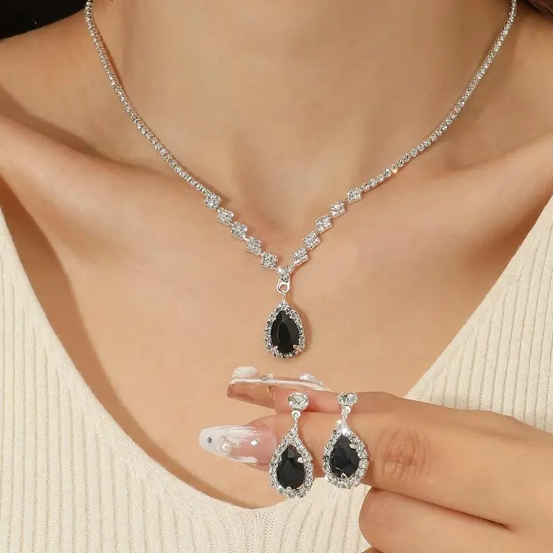 Boho-inspired April birthstone jewelry set featuring silver-plated zinc alloy with synthetic stone, includes water drop earrings and pendant necklace, perfect for parties and music festivals