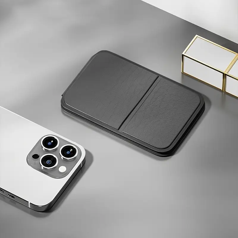 Foldable compact pocket makeup mirror with high-definition rectangular glass, faux leather frame, tabletop stand, and character-themed design