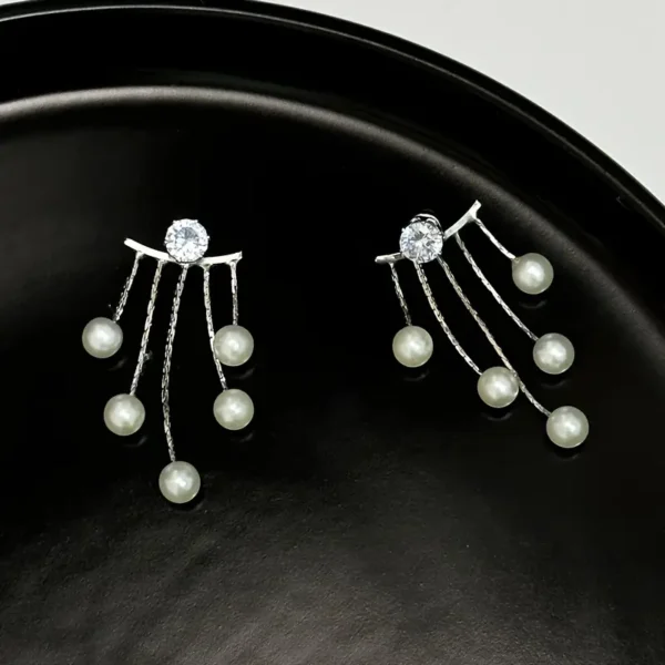 Elegant pearl tassel earrings with a unique retro-inspired design, fashionable vintage-style jewelry for women
