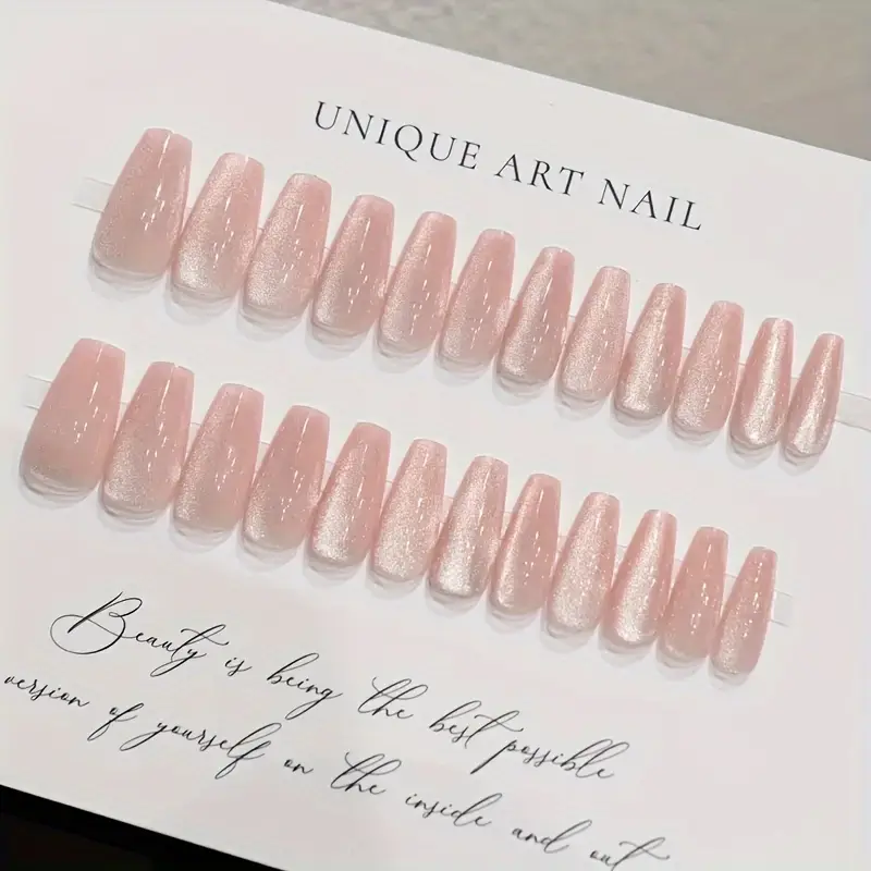 Set of 24 reflective pink cat eye Christmas press-on nails with shiny sequin design, includes nail file and jelly glue, perfect for women and girls