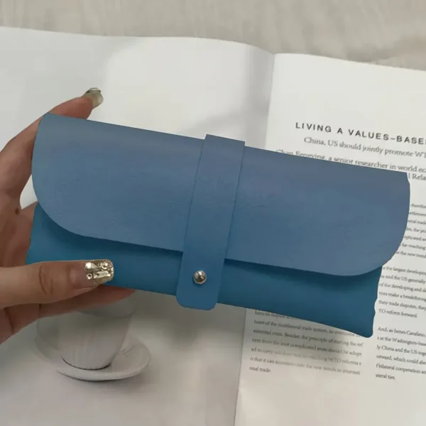 Stylish faux leather eyeglass case with soft closure, minimalist design, available in 10 colors, portable pouch for daily use and accessory storage