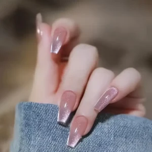 Set of 24 reflective pink cat eye Christmas press-on nails with shiny sequin design, includes nail file and jelly glue, perfect for women and girls