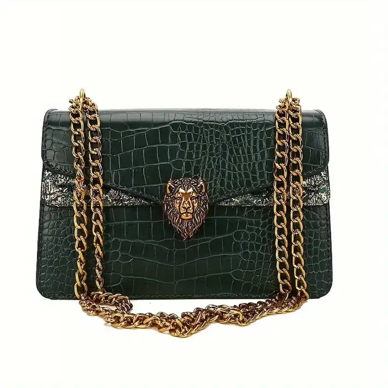 Women's black faux leather crossbody shoulder bag with snake-print design, gold chain strap, lion head emblem, magnetic closure, and elegant lace trim – compact purse for everyday use