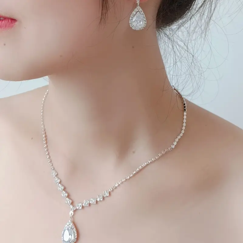 Boho-inspired April birthstone jewelry set featuring silver-plated zinc alloy with synthetic stone, includes water drop earrings and pendant necklace, perfect for parties and music festivals