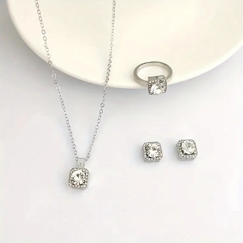 Elegant rhinestone jewelry set with alloy necklace, earrings, and ring, perfect fashion accessory for women and teens for parties or special occasions