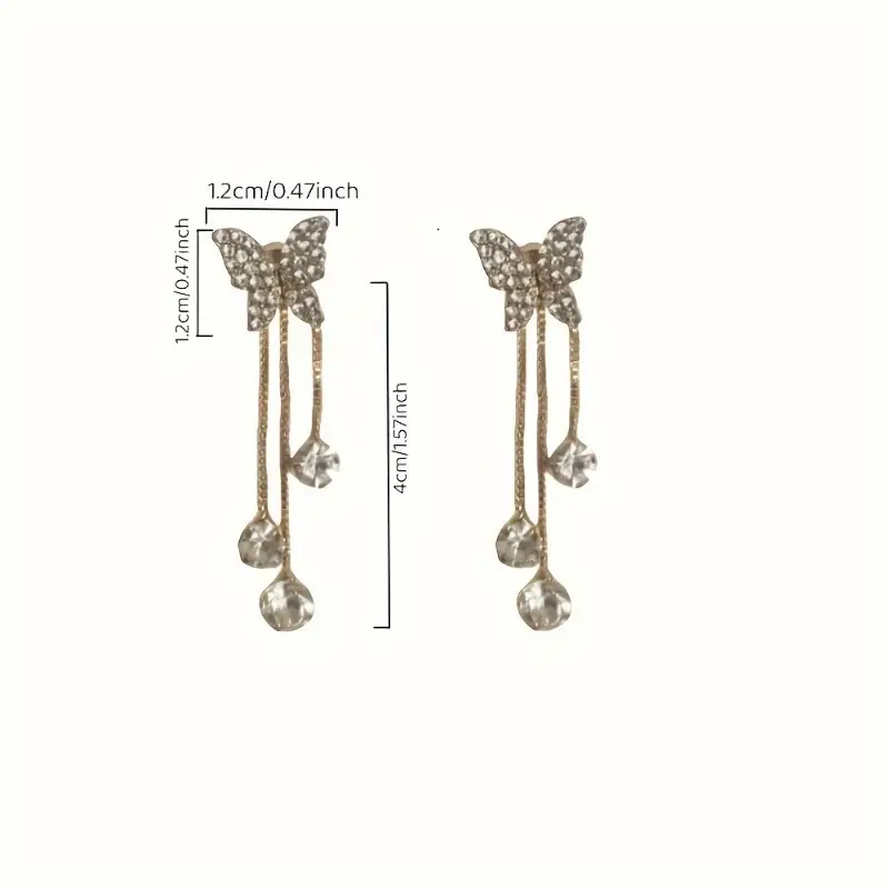 Elegant gold butterfly dangle earrings with sparkling zirconia accents, stylish jewelry for weddings and everyday glamour