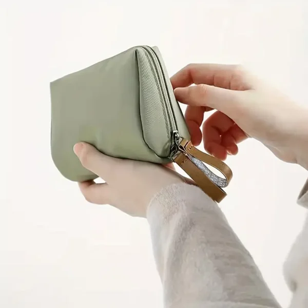 Compact zippered makeup storage bag designed to hold one lipstick, perfect for travel, daily outings, and outdoor use – lightweight and portable clutch